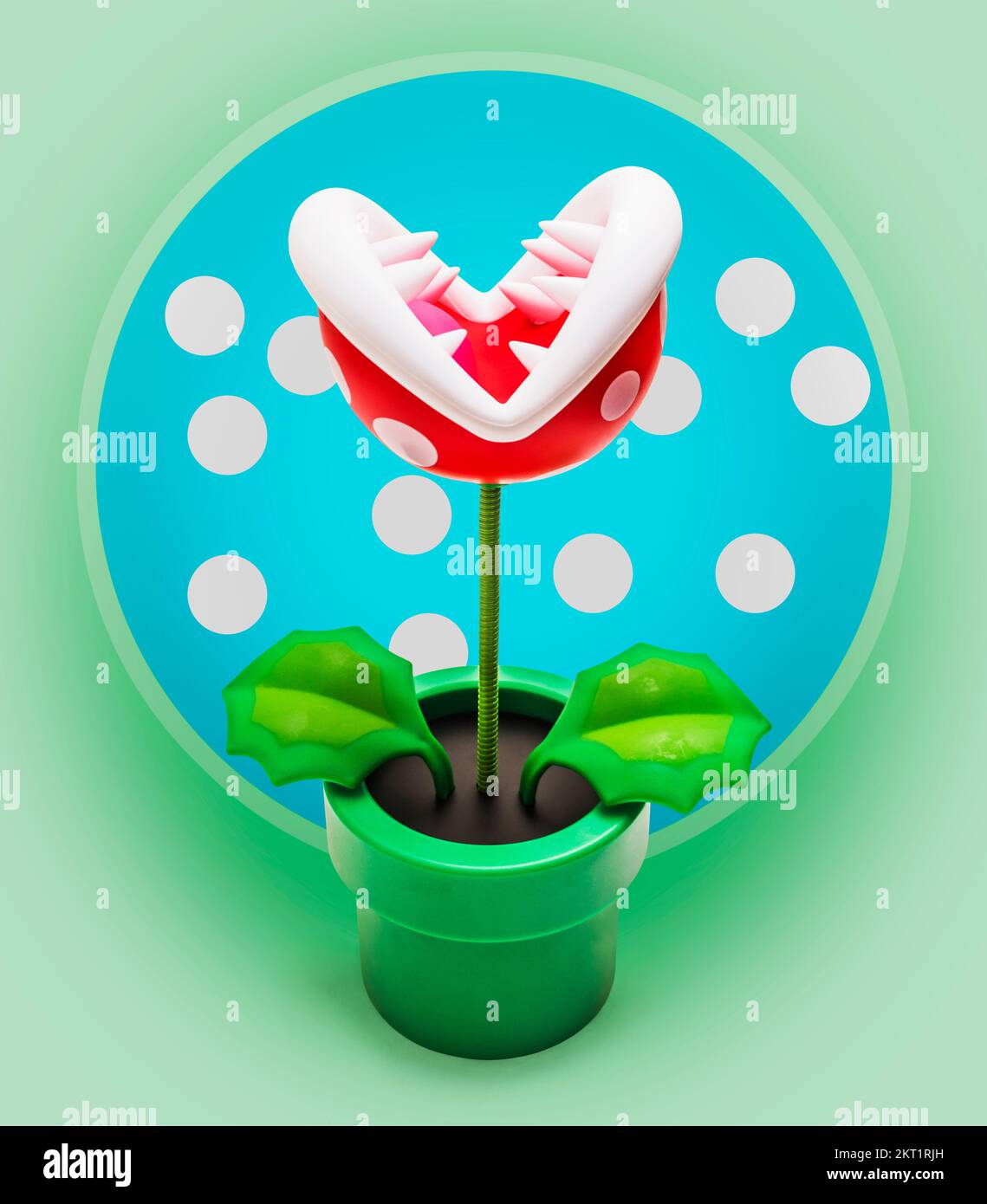 Cartoonish game play in a arcade of creepy fun with piranha plant on decorative blue background. Bitancial Stock Photo