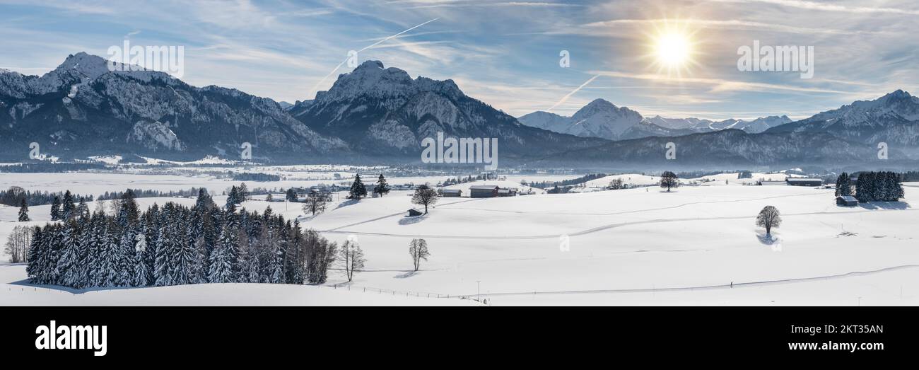calm panoramic winter landscape with snow and mountain range Stock Photo