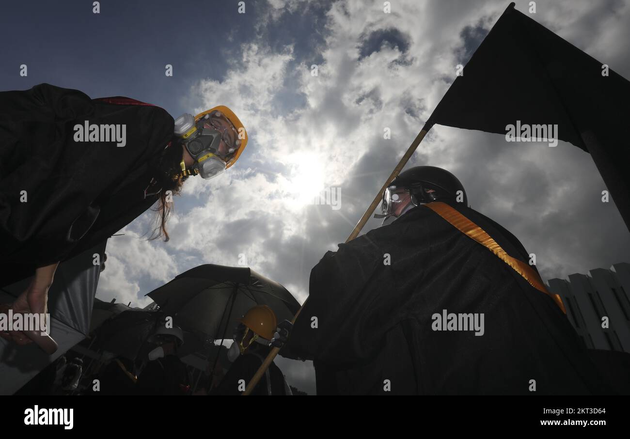 Graduates of the Chinese University of Hong Kong (CUHK) wearing