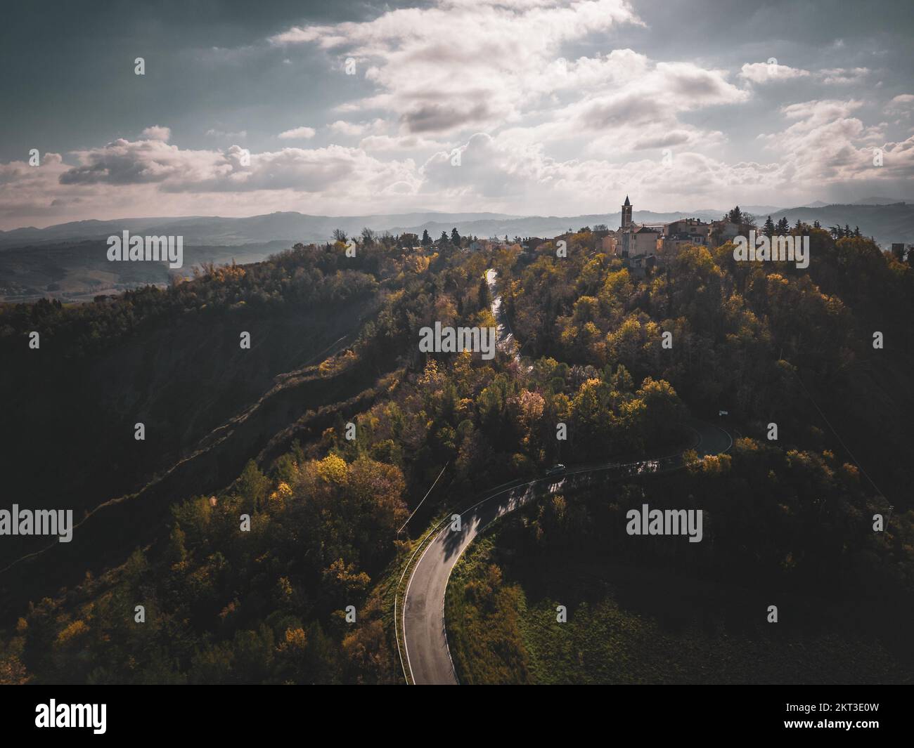 aerial view of a scenic road in a hilly area Stock Photo