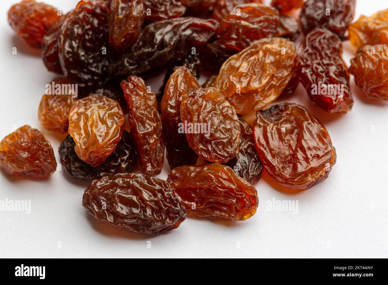 dried sultanas on a white background Stock Photo