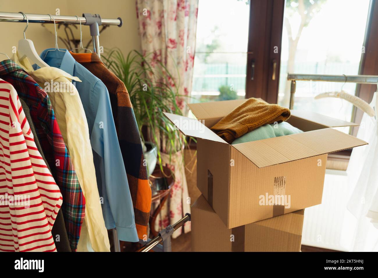 Pre owned clothes resale or rental clothing Stock Photo Alamy