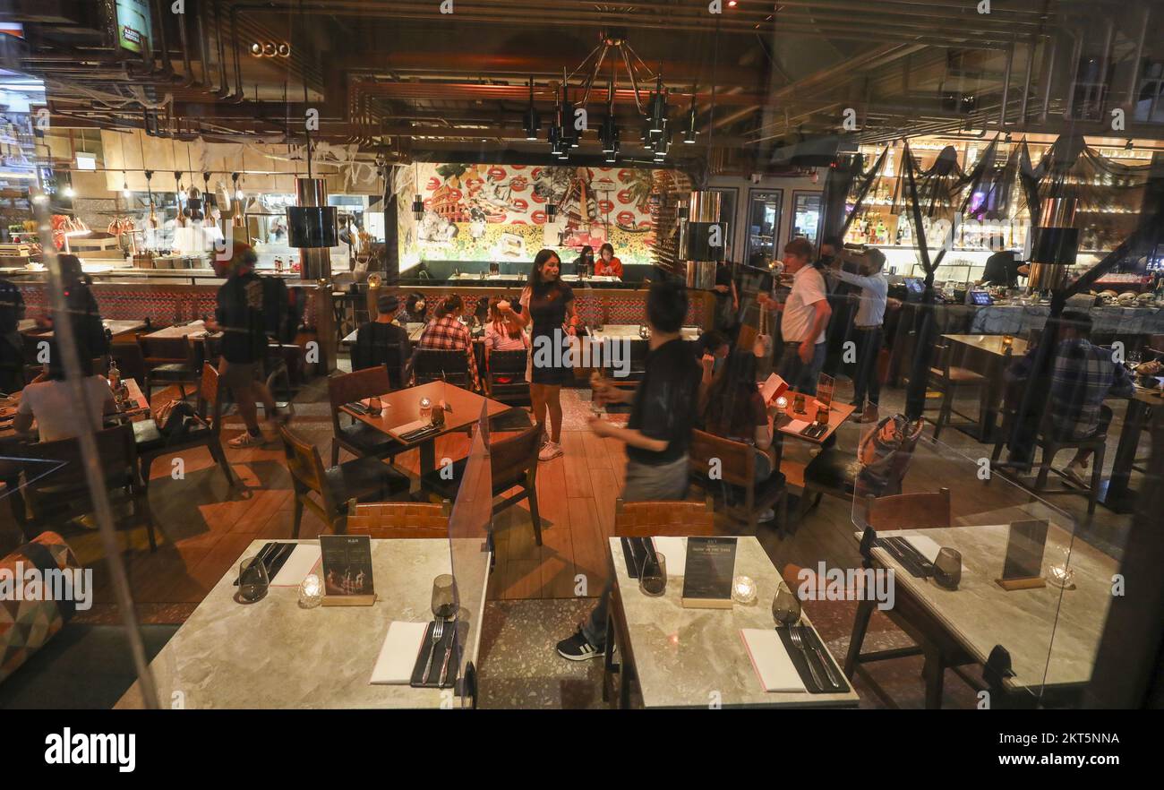 A restaurant in Lan Kwai Fong with empty tables on Halloween, which falls on a Sunday and after a fatal stampede at packed Halloween festivities in the South Korean capital of Seoul. 30OCT22 SCMP / Xiaomei Chen Stock Photo