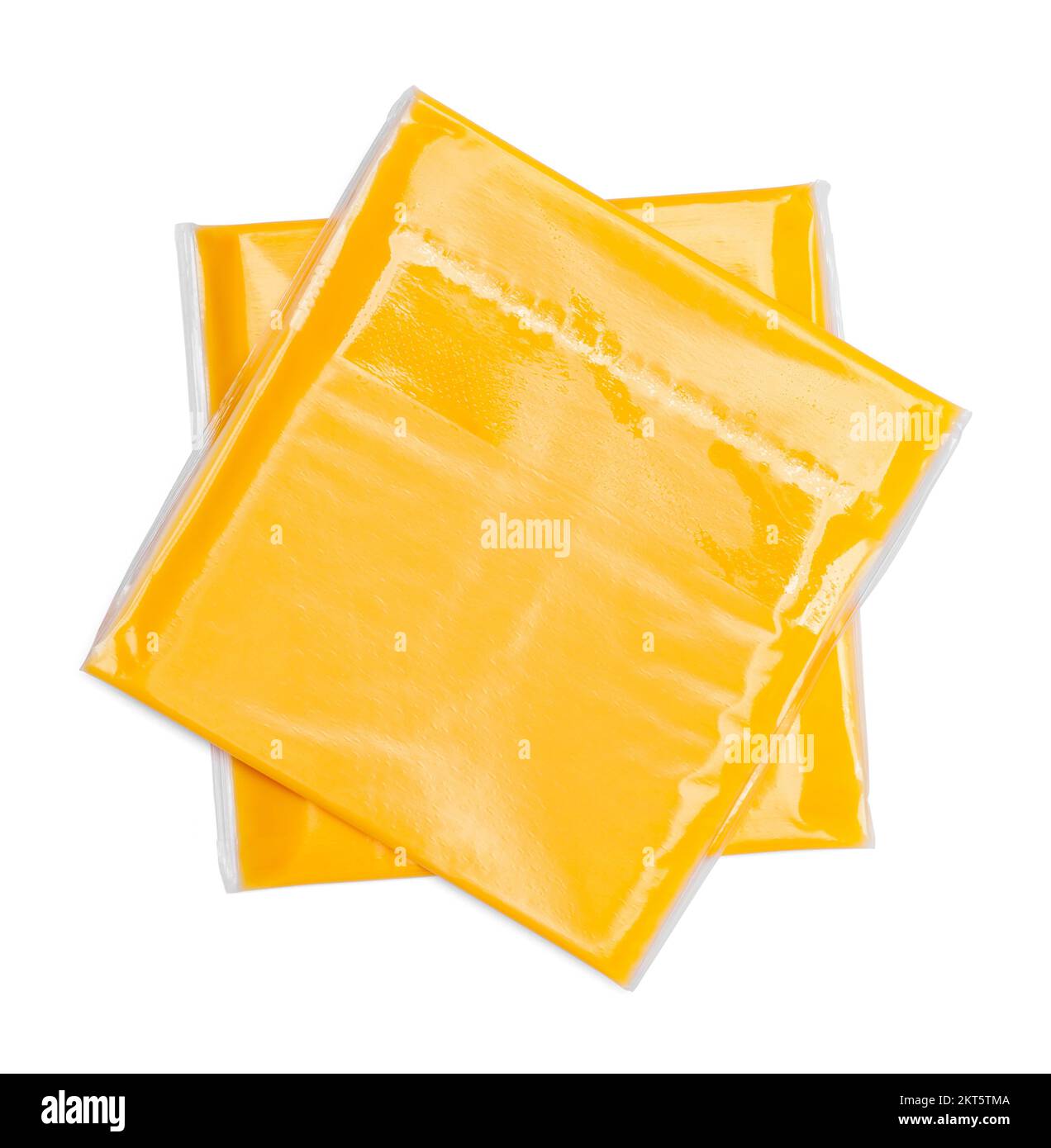 Two Wrapped Slices of Cheese Cut Out on White. Stock Photo