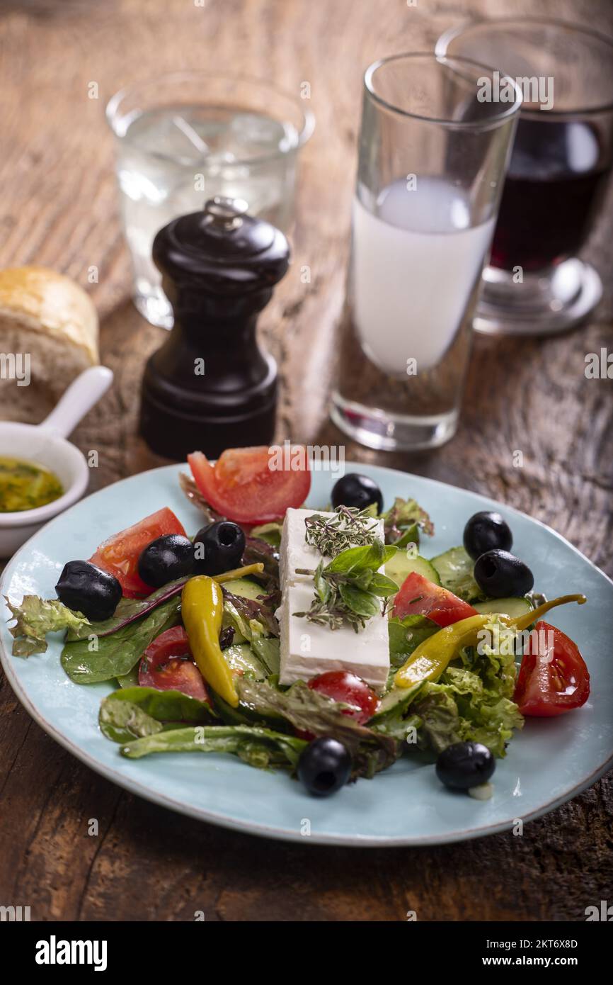 Greek Salad On Dark Wood Stock Photo