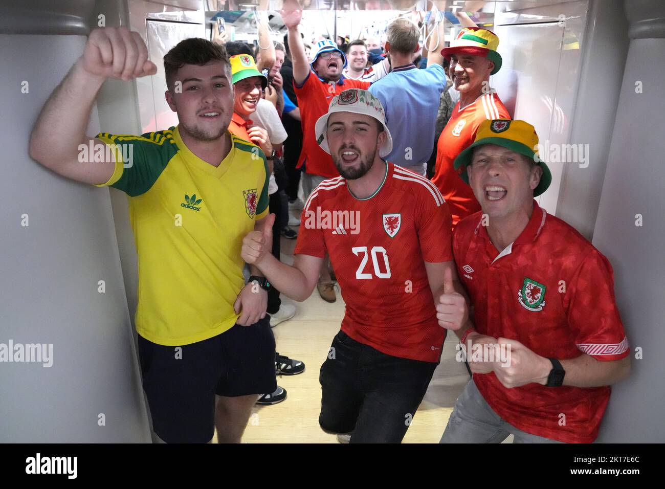 Wales fans on the metro heading towards the Ahmad Bin Ali Stadium, ahead of the FIFA World Cup Group B match between Wales and England. Picture date: Tuesday November 29, 2022. Stock Photo