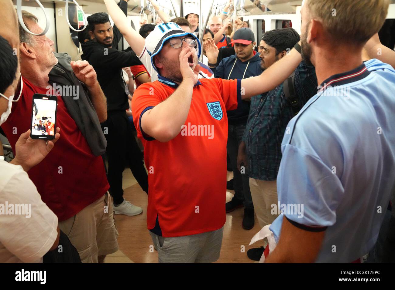 England fans on the metro heading towards the Ahmad Bin Ali Stadium, ahead of the FIFA World Cup Group B match between Wales and England. Picture date: Tuesday November 29, 2022. Stock Photo