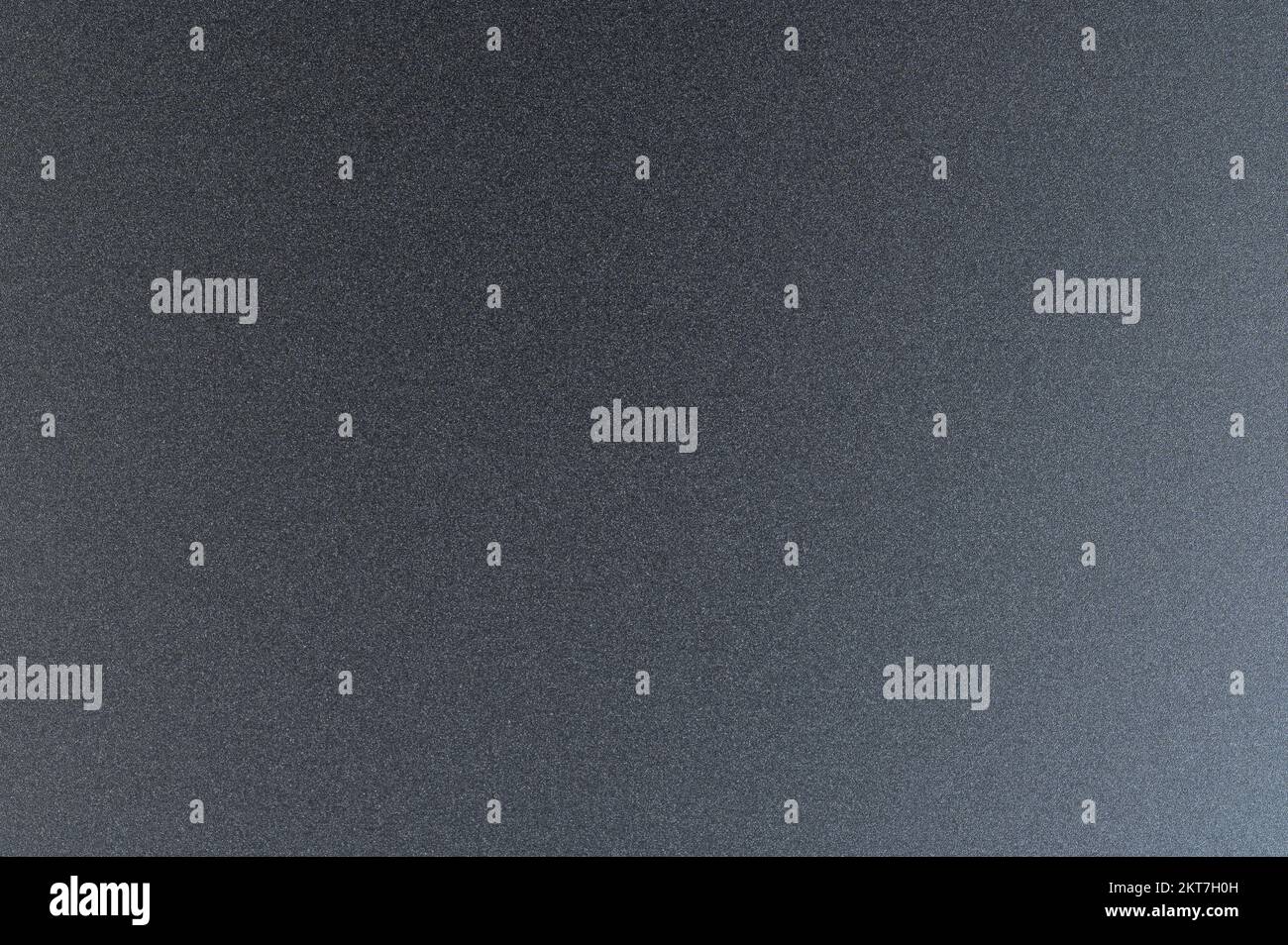 Grainy dark metal surface macro close up view Stock Photo