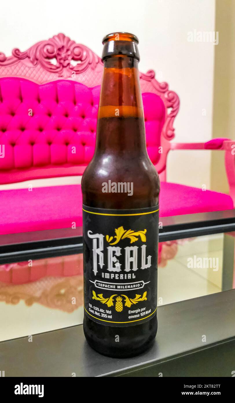 Beer bottle Real Imperial on table drinking alcohol in Cancun Quintana