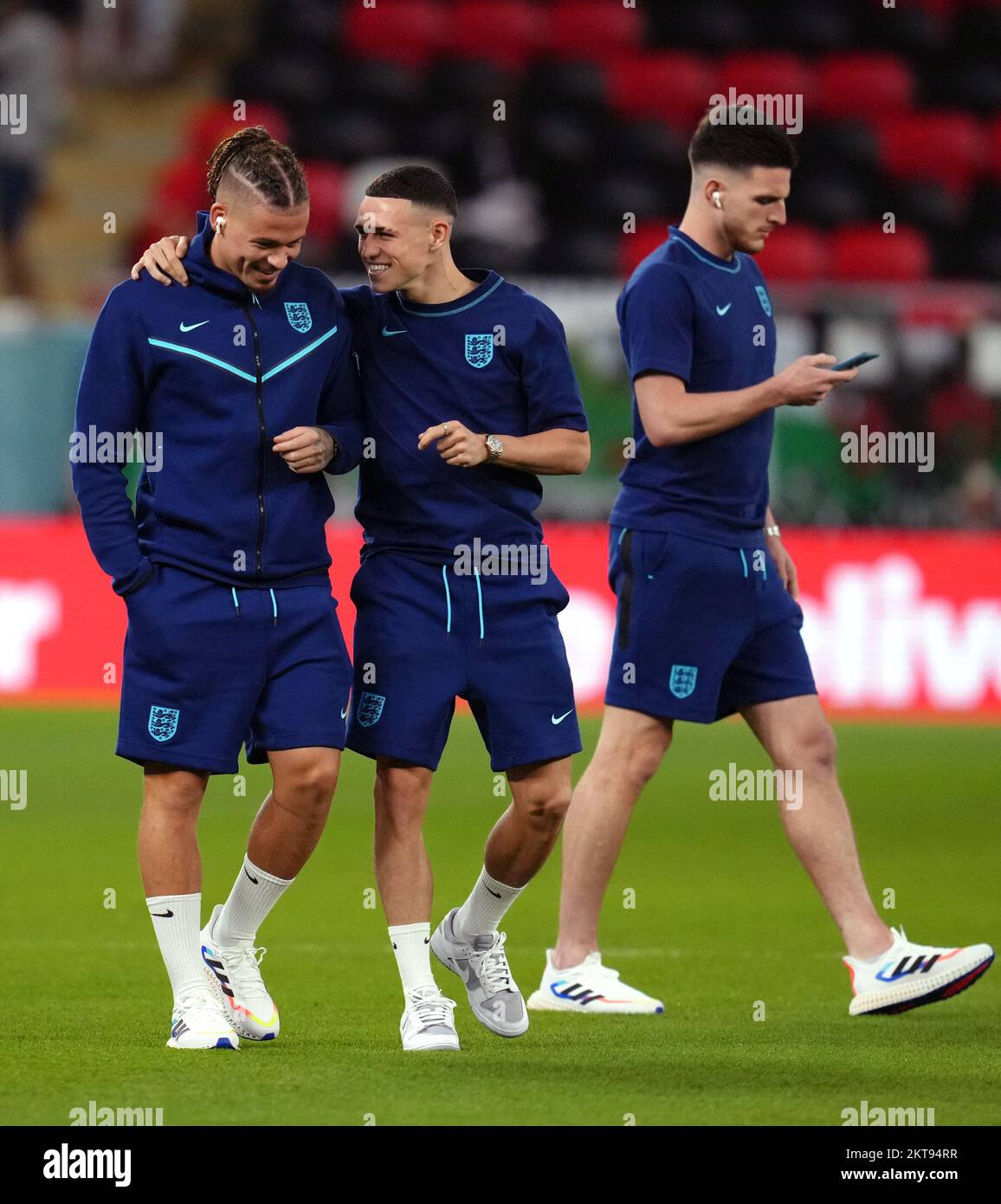 England's Kalvin Phillips (left) with Phil Foden and Declan Rice (right) ahead of the FIFA World Cup Group B match at the Ahmad Bin Ali Stadium, Al Rayyan, Qatar. Picture date: Tuesday November 29, 2022. Stock Photo