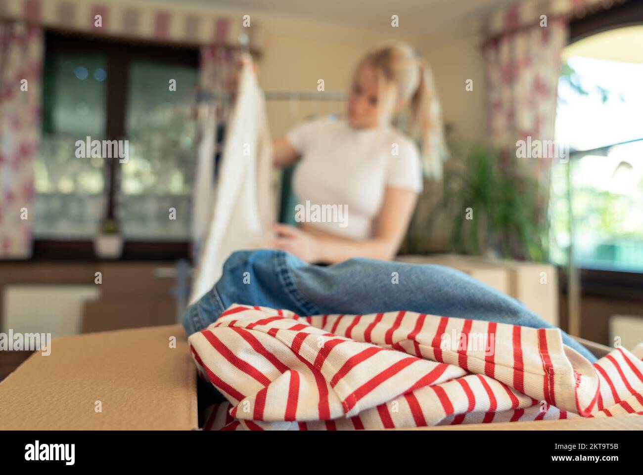 Pre owned clothes resale or donation. Stock Photo