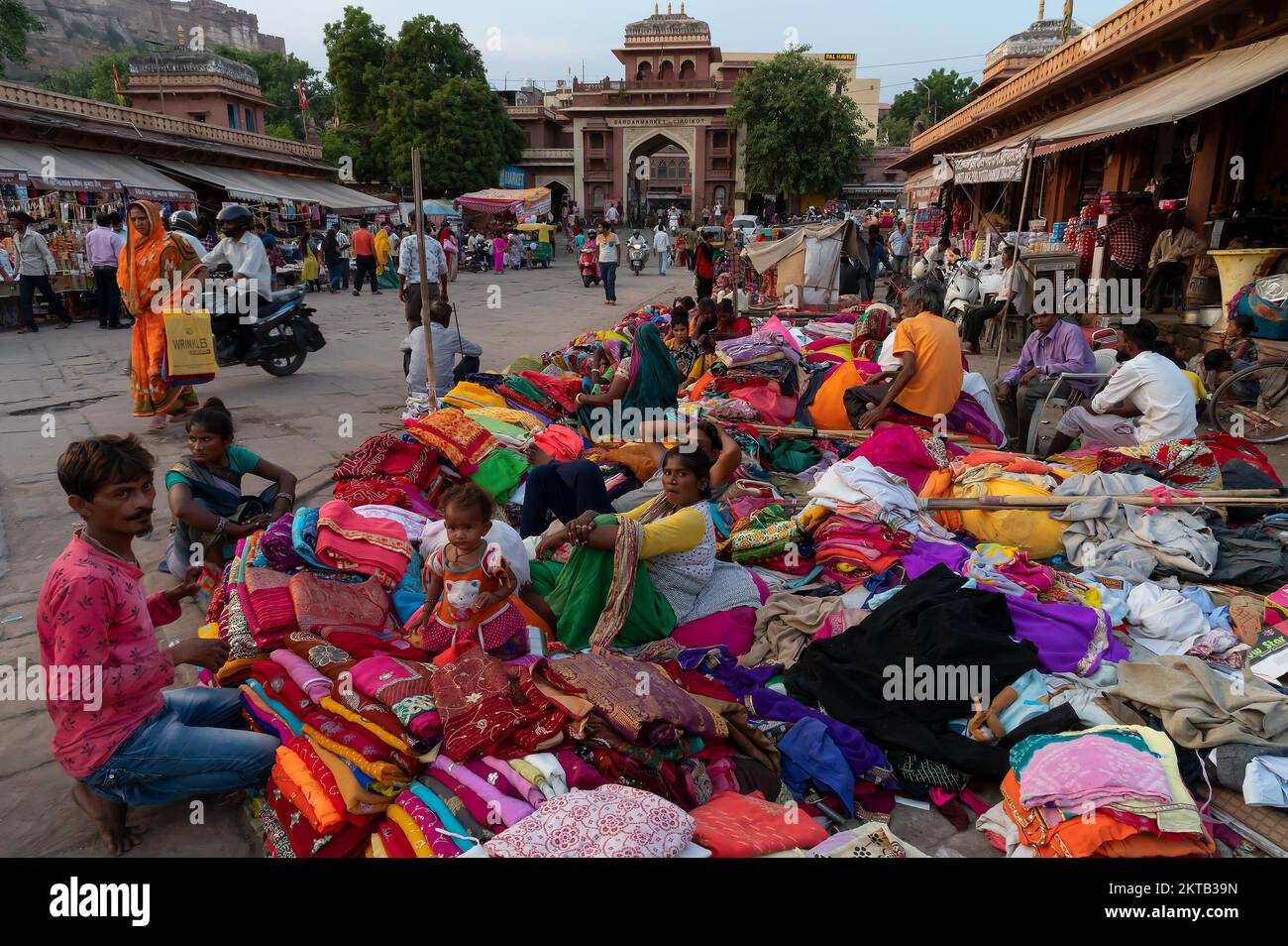 Jodhpur, Rajasthan, India - 20.10.2019 : Rajasthani womens clothes being sold at Famous Sardar Market and Ghanta ghar Clock tower in the evening. Stock Photo