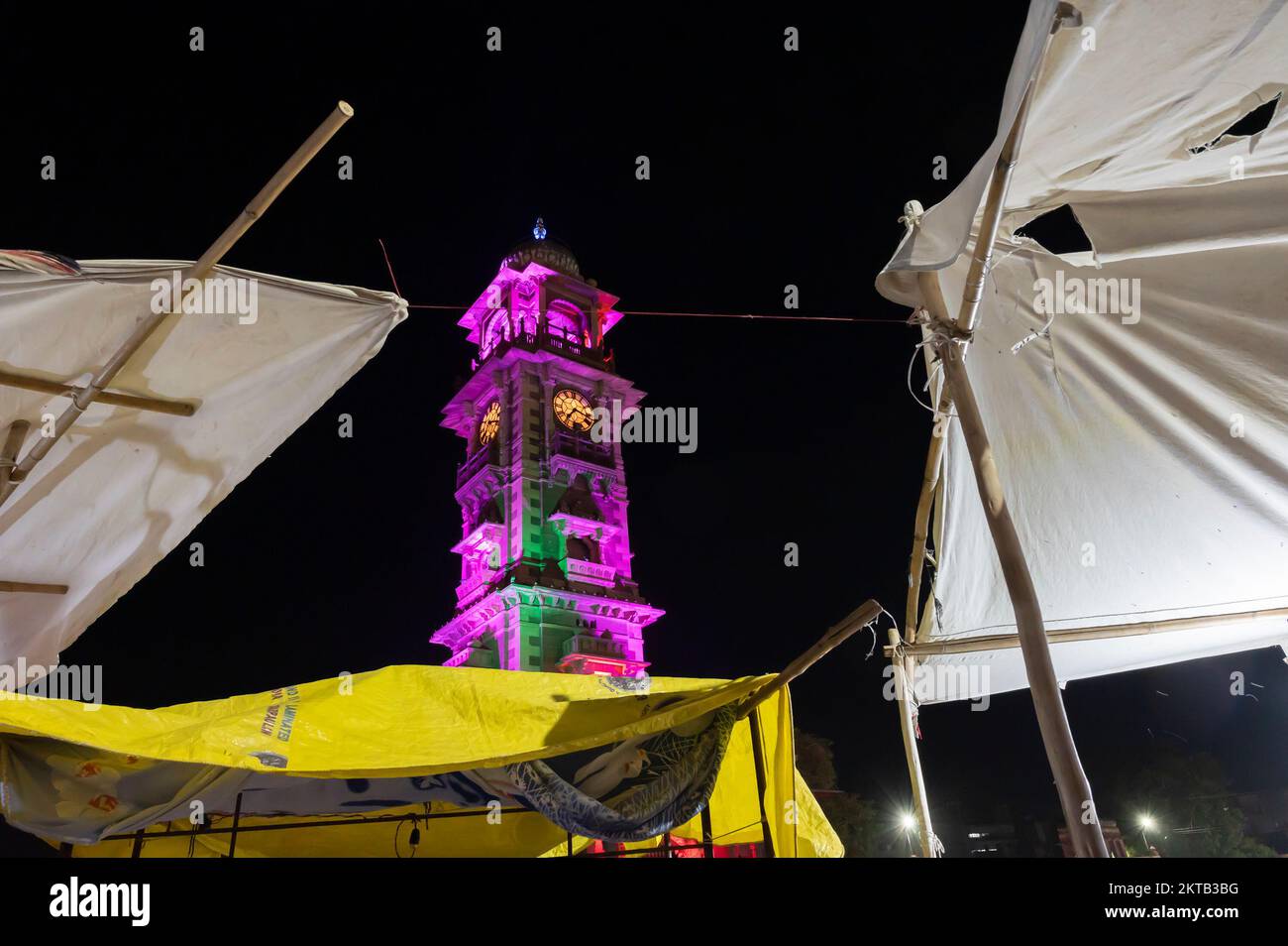 Jodhpur, Rajasthan, India - 18.10.2019 : Famous Sardar Market and Ghanta ghar Clock tower at night in Jodhpur, Rajasthan, India. Market place in foreg Stock Photo