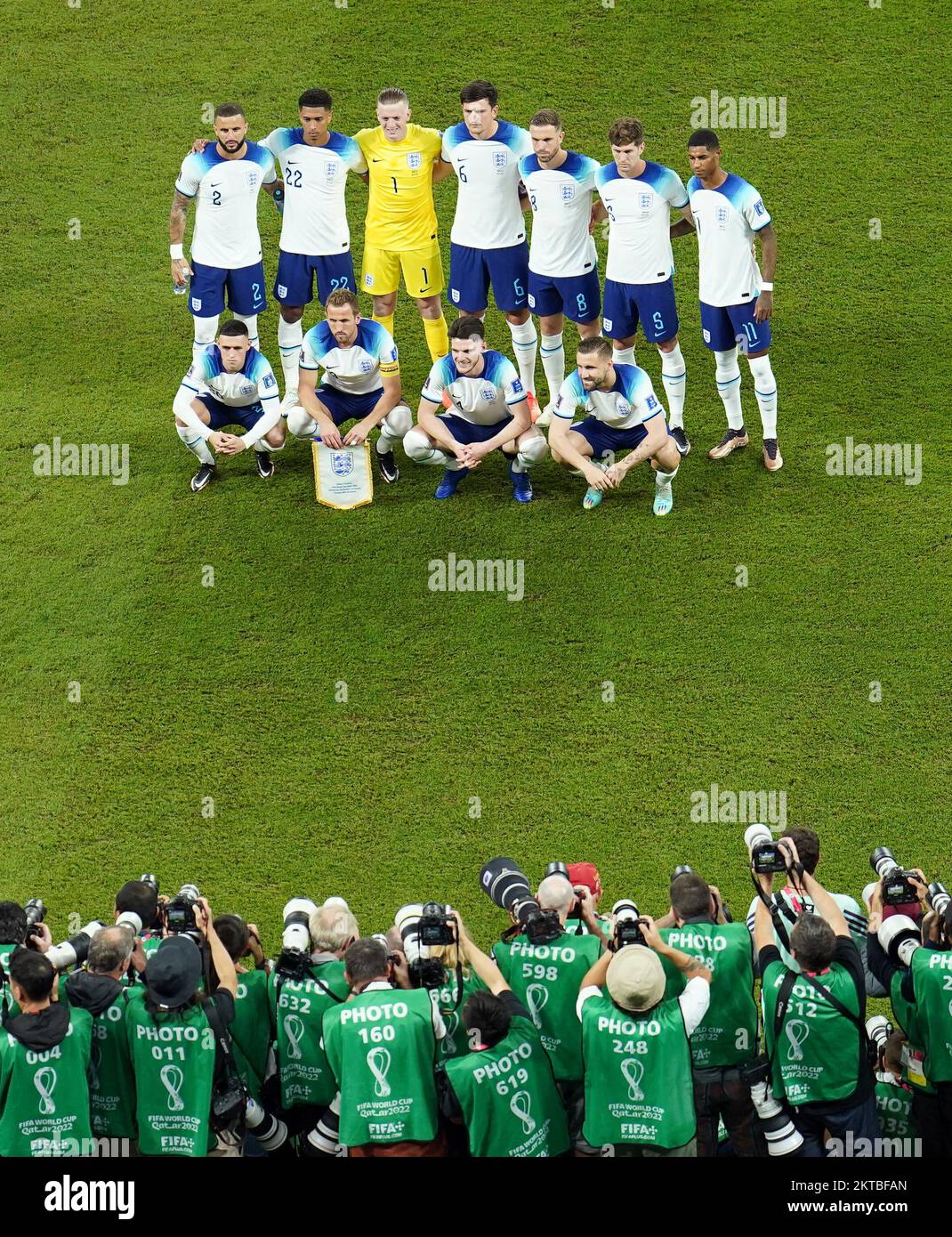 England players line up for a team group in front of photographers ahead of the FIFA World Cup Group B match at the Ahmad Bin Ali Stadium, Al Rayyan, Qatar. Picture date: Tuesday November 29, 2022. Stock Photo