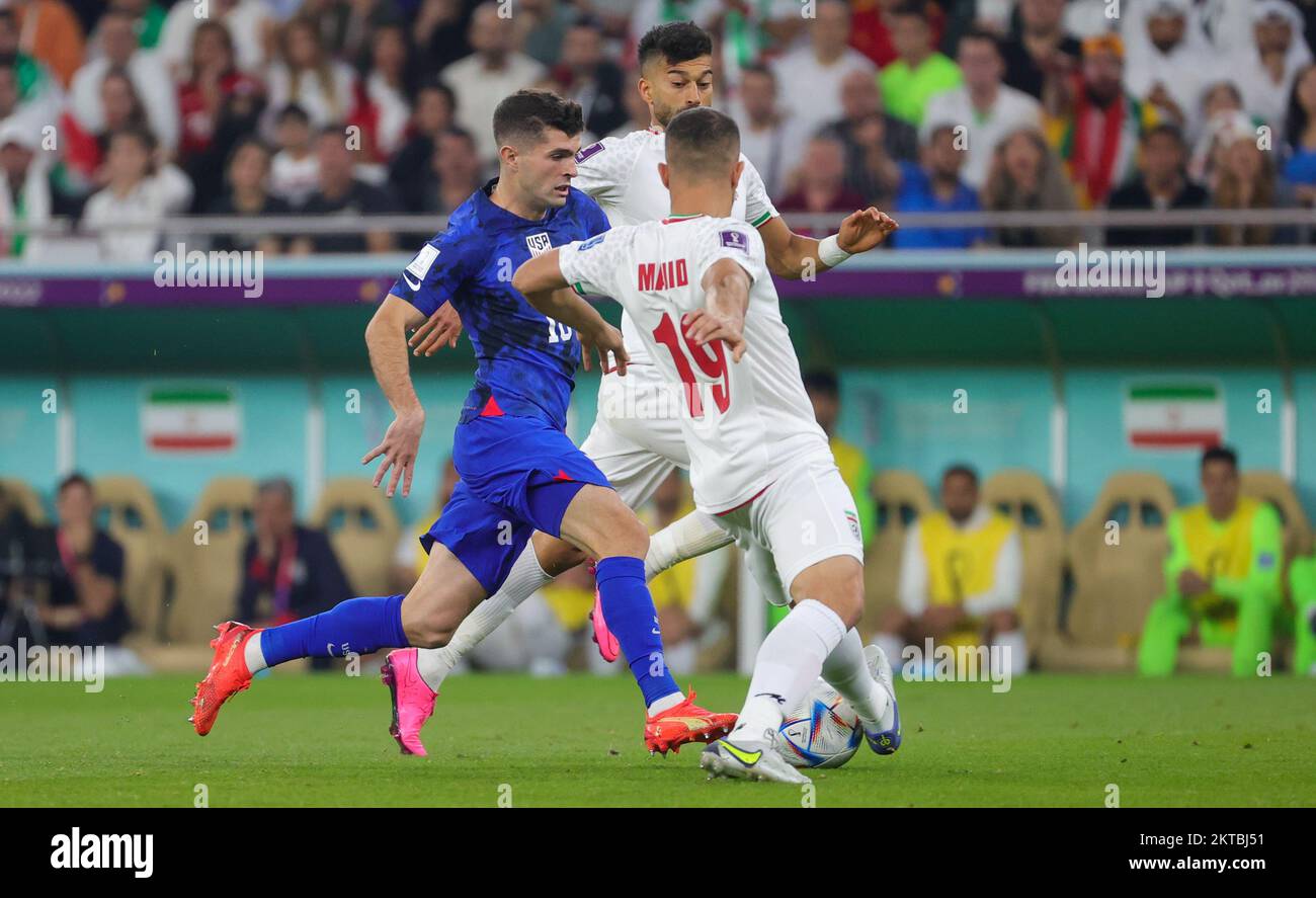 Doha, Qatar 29 November 2022. US Christian Pulisic and Iranian Majid Hosseini fight for the ball during a soccer game between Iran and USA, the third and last game in the Group B of the FIFA 2022 World Cup in Al Thumama Stadium, Doha, State of Qatar on Tuesday 29 November 2022. BELGA PHOTO VIRGINIE LEFOUR Stock Photo