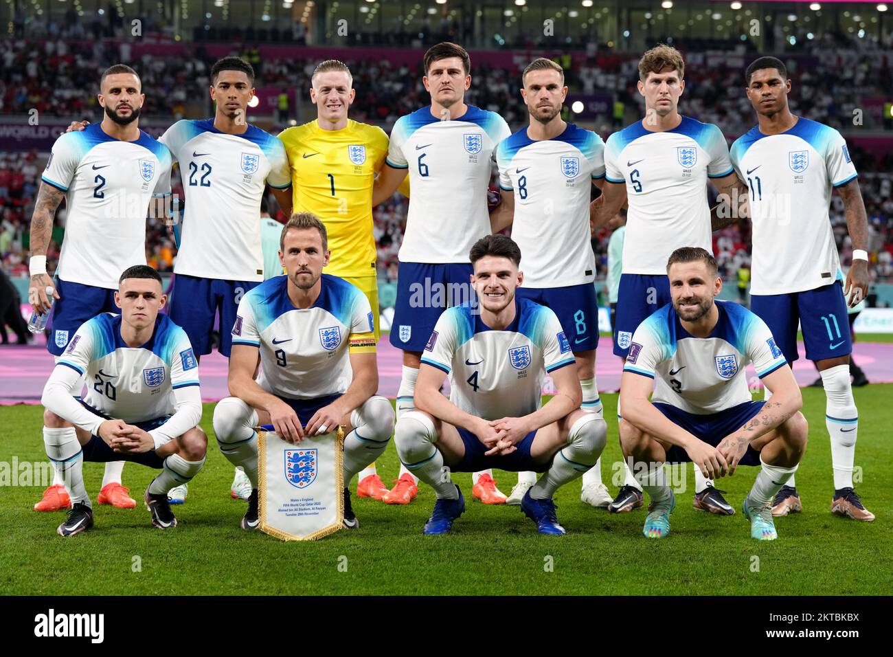 England's (left-right, back row) Kyle Walker, Jude Bellingham, Jordan Pickford, Harry Maguire, Jordan Henderson, John Stones, Marcus Rashford, (front row, left-right) Phil Foden, Harry Kane, Declan Rice and Luke Shaw line up for a team group ahead of the FIFA World Cup Group B match at the Ahmad Bin Ali Stadium, Al Rayyan, Qatar. Picture date: Tuesday November 29, 2022. Stock Photo