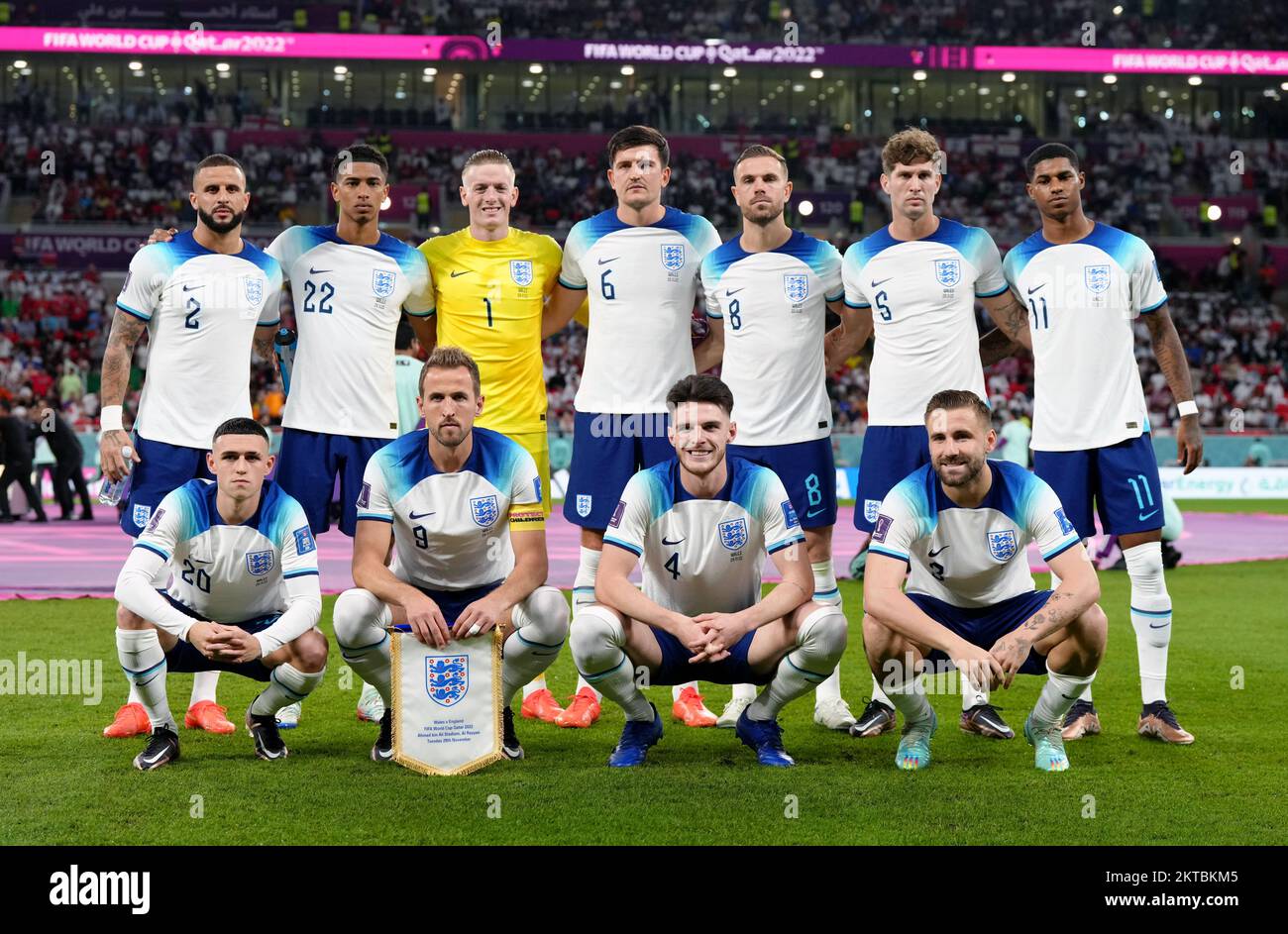 England's (left-right, back row) Kyle Walker, Jude Bellingham, Jordan Pickford, Harry Maguire, Jordan Henderson, John Stones, Marcus Rashford, (front row, left-right) Phil Foden, Harry Kane, Declan Rice and Luke Shaw line up for a team group ahead of the FIFA World Cup Group B match at the Ahmad Bin Ali Stadium, Al Rayyan, Qatar. Picture date: Tuesday November 29, 2022. Stock Photo