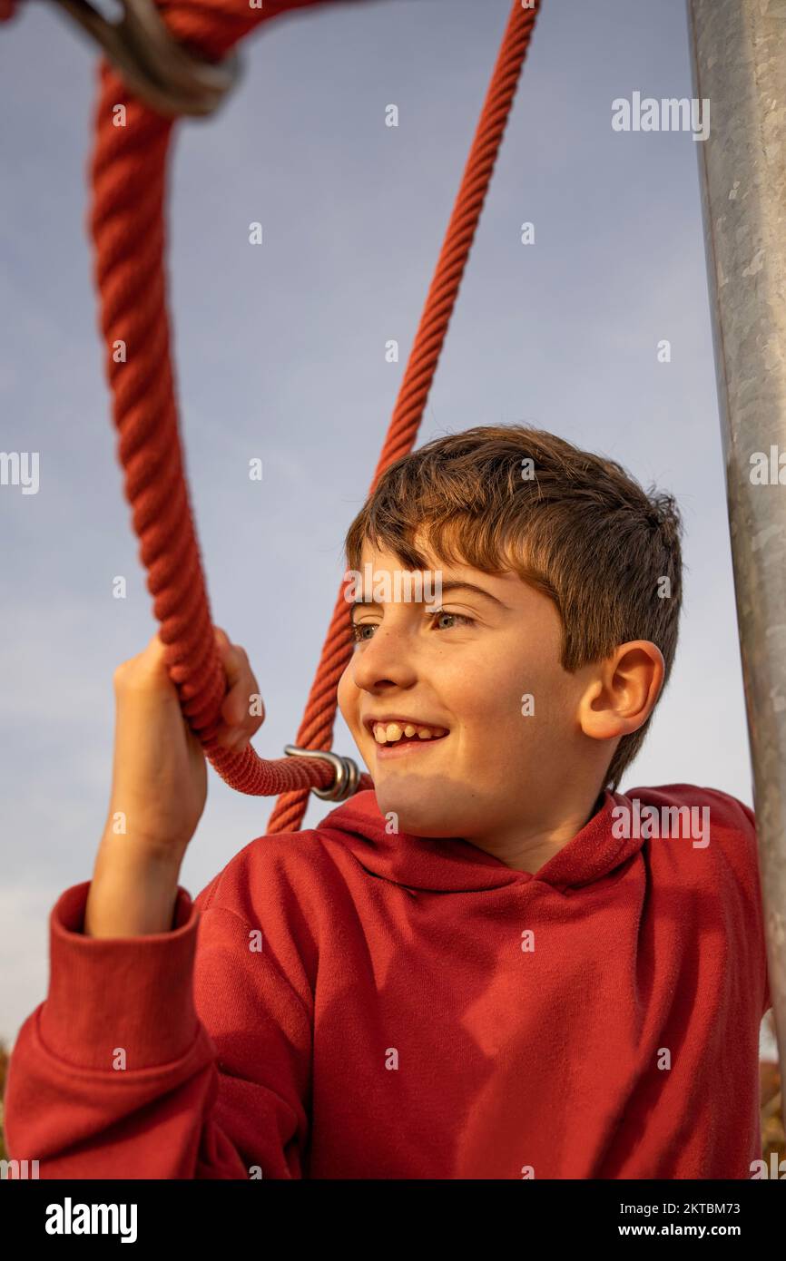 Boy Using A Rope Boy holding rope hi-res stock photography and images - Alamy