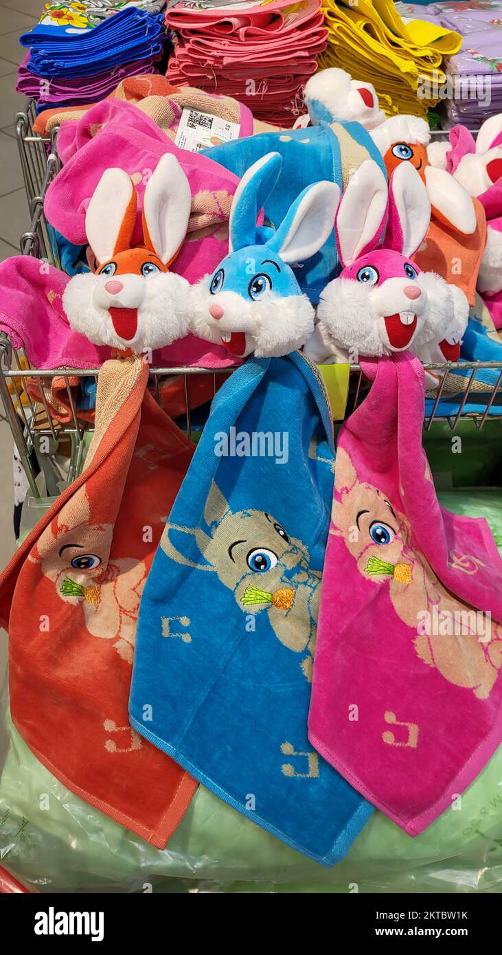 New Year and Easter design of Colorful fluffy hand Towels with rabbits. Stock Photo