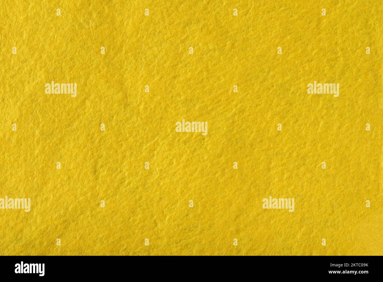 Texture of yellow felt. Abstract background with yellow felt. High