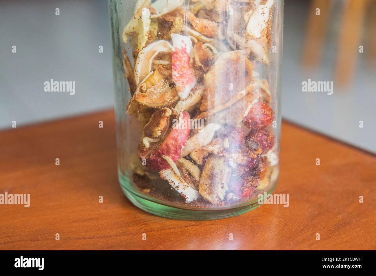 Jar of dried fruits that worms eat Stock Photo