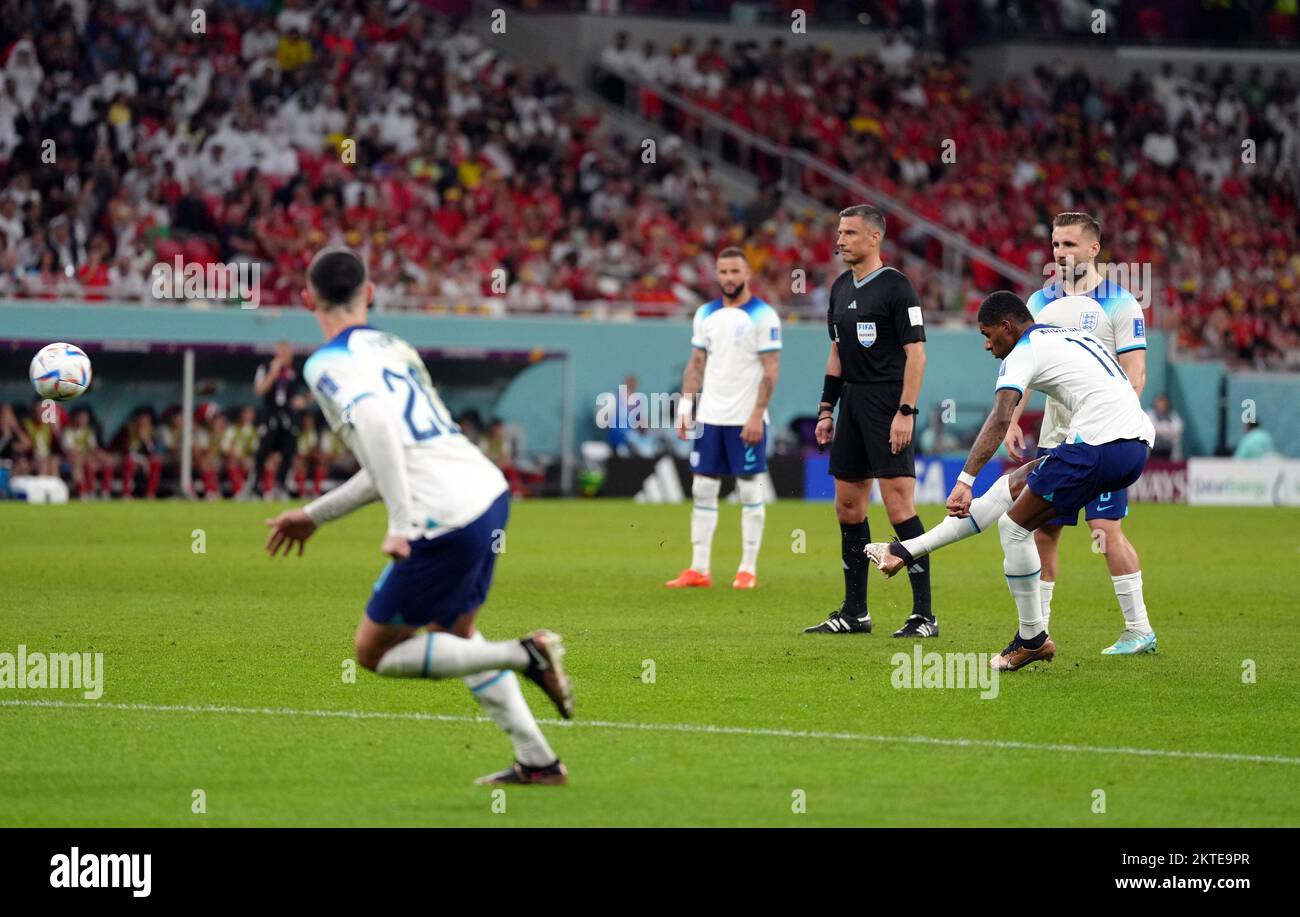 England's Marcus Rashford scores the opening goal during the FIFA World Cup Group B match at the Ahmad Bin Ali Stadium, Al Rayyan, Qatar. Picture date: Tuesday November 29, 2022. Stock Photo