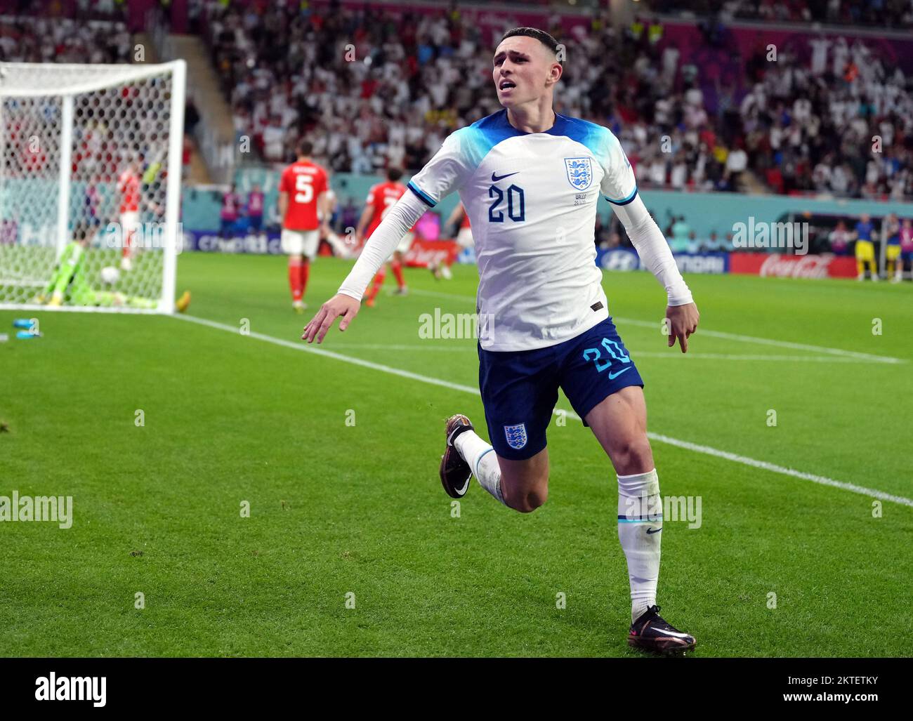 England's Phil Foden celebrates scoring the second goal during the FIFA World Cup Group B match at the Ahmad Bin Ali Stadium, Al Rayyan, Qatar. Picture date: Tuesday November 29, 2022. Stock Photo