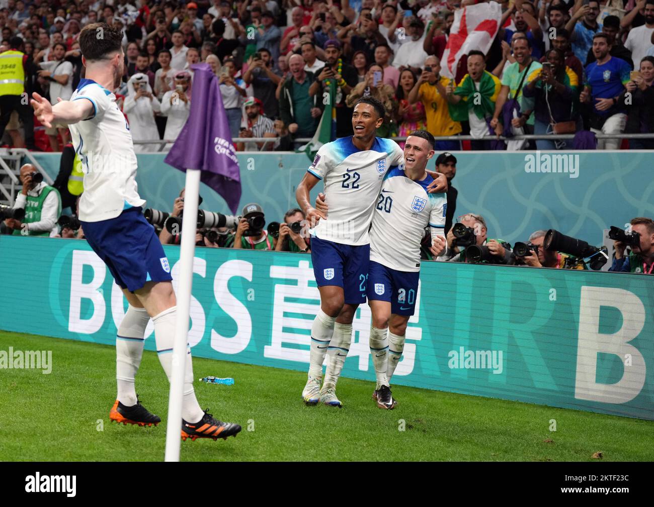 England's Phil Foden celebrates scoring the second goal with Jude Bellingham and Declan Rice during the FIFA World Cup Group B match at the Ahmad Bin Ali Stadium, Al Rayyan, Qatar. Picture date: Tuesday November 29, 2022. Stock Photo