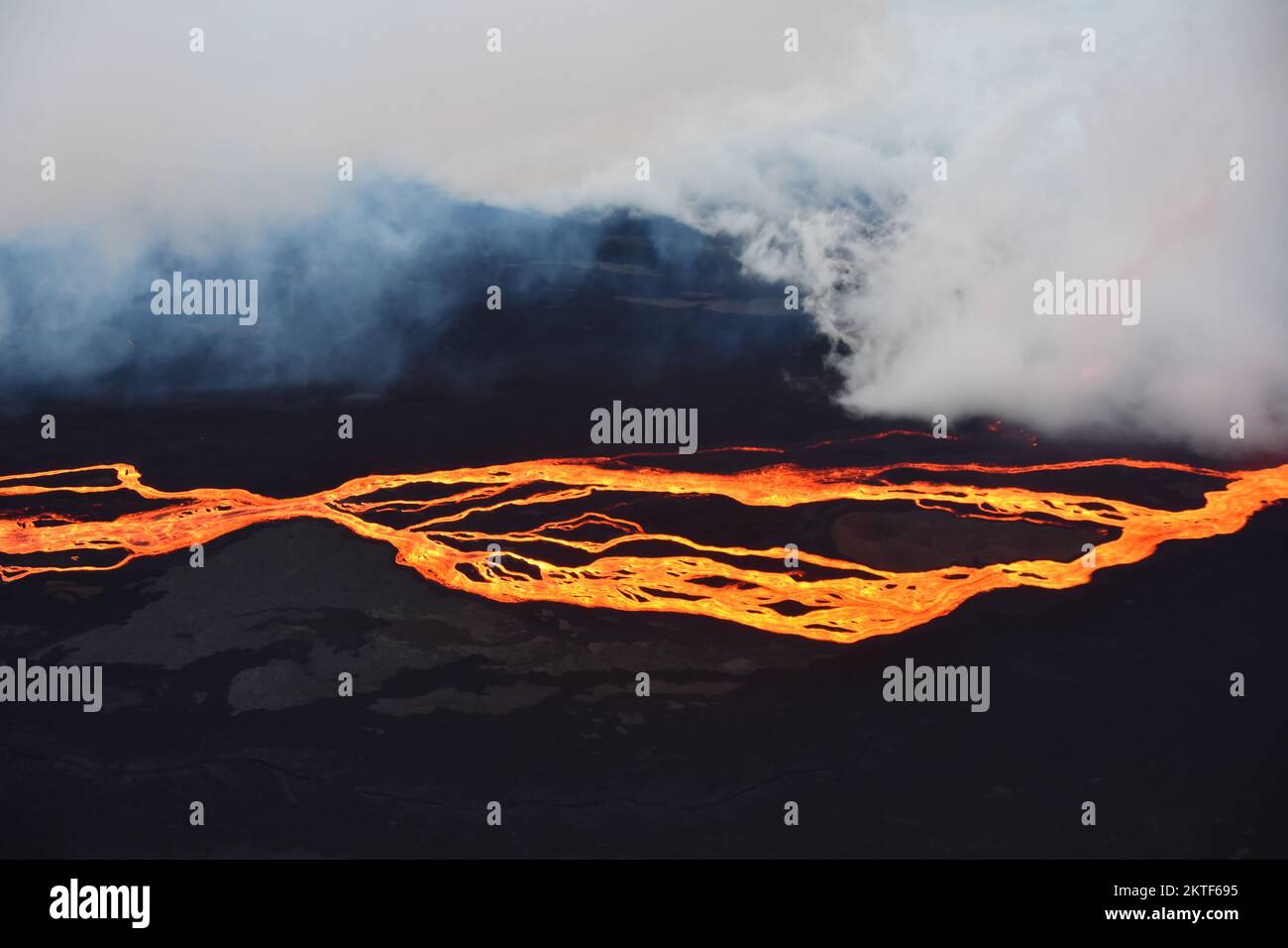 Mauna Loa, United States of America. 28 November, 2022. Lava flows during an eruption in the Northeast Rift Zone on the caldera summit of Mauna Loa at Hawaii Volcanoes National Park, November 28, 2022 in Hawaii. The new eruption, which is the first since 1984 in the worlds largest active volcano. Credit: Civil Air Patrol/USGS/Alamy Live News Stock Photo