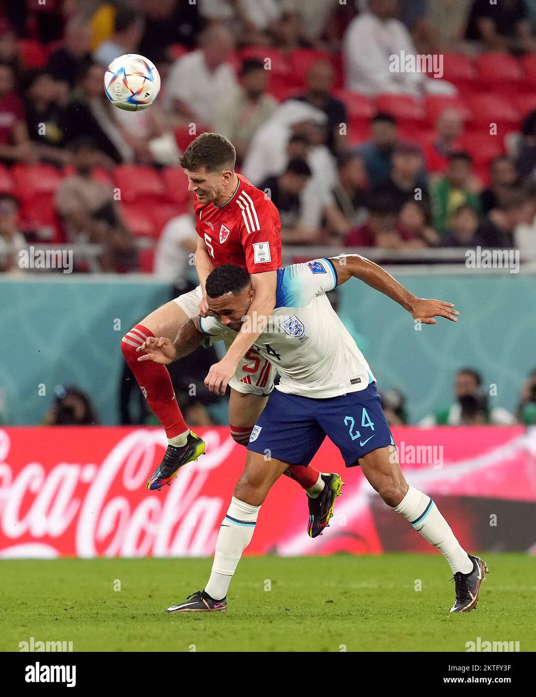 Empha M Wales’ Chris Mepham heads the ball above England’s Callum Wilson during ...
