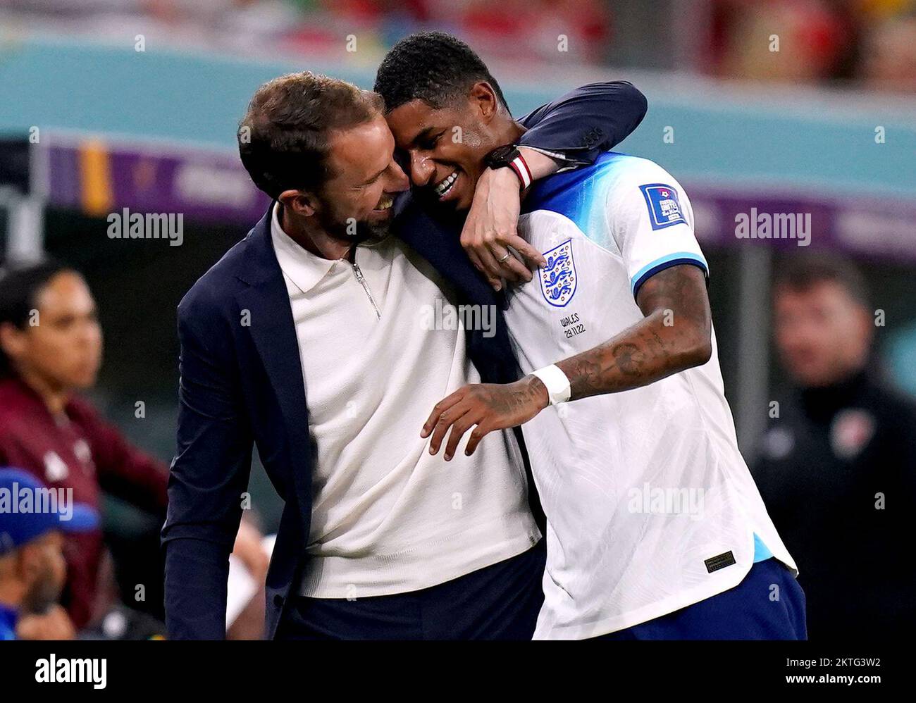 England's Marcus Rashford with manager Gareth Southgate as he is substituted during the FIFA World Cup Group B match at the Ahmad Bin Ali Stadium, Al Rayyan, Qatar. Picture date: Tuesday November 29, 2022. Stock Photo