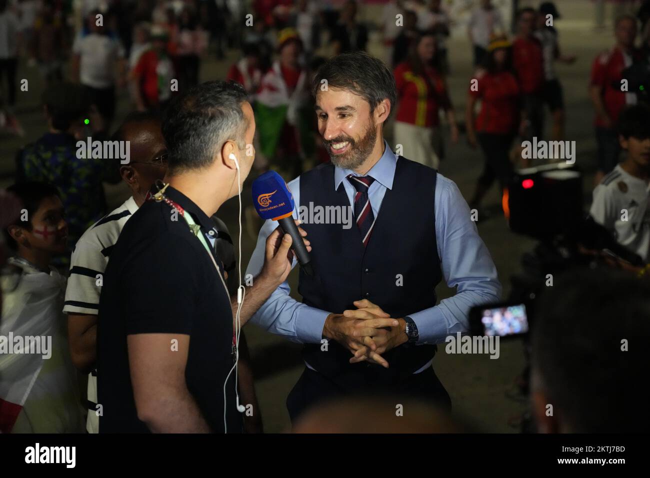 Neil Rowe, a Gareth Southgate impersonator, being interviewed by Lebanon media channel Al Mayadeen outside the stadium following the FIFA World Cup Group B match between Wales and England. Picture date: Tuesday November 29, 2022. Stock Photo