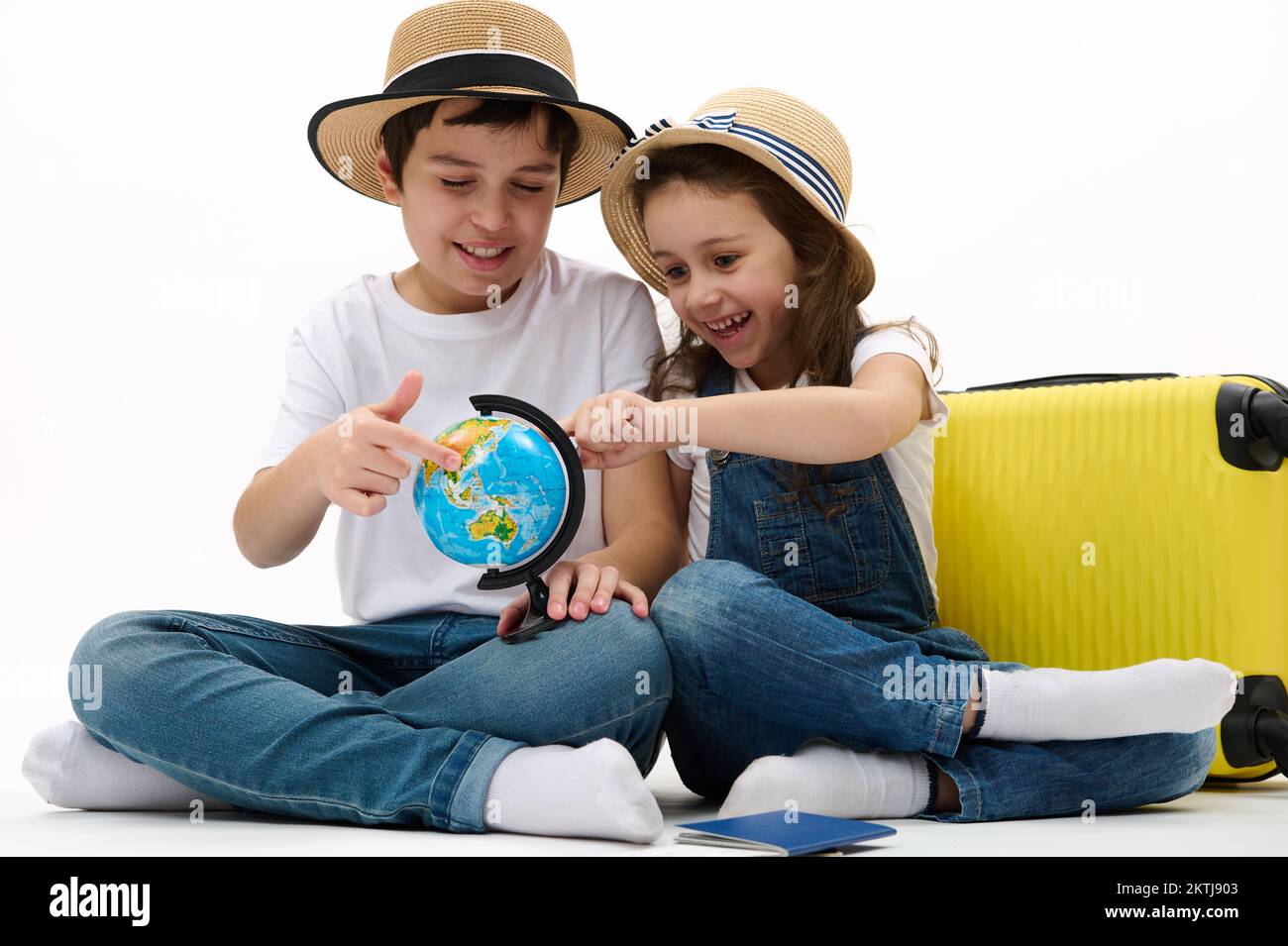 Happy kids travelling abroad for summer holidays. Brother and sister