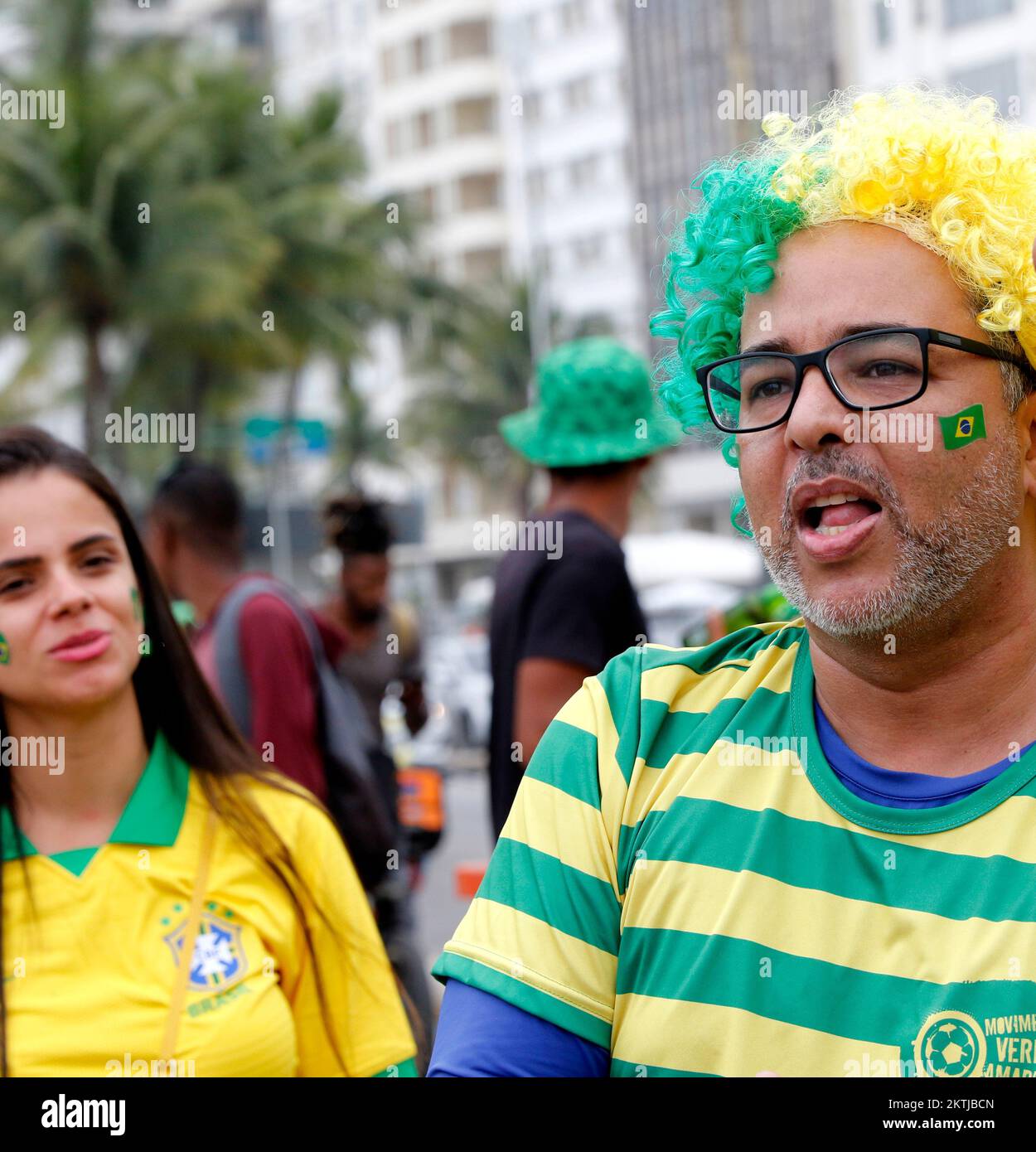 Brazilian fans gather at street party to support national soccer team playing Fifa World Cup at Fan Festival arena Stock Photo