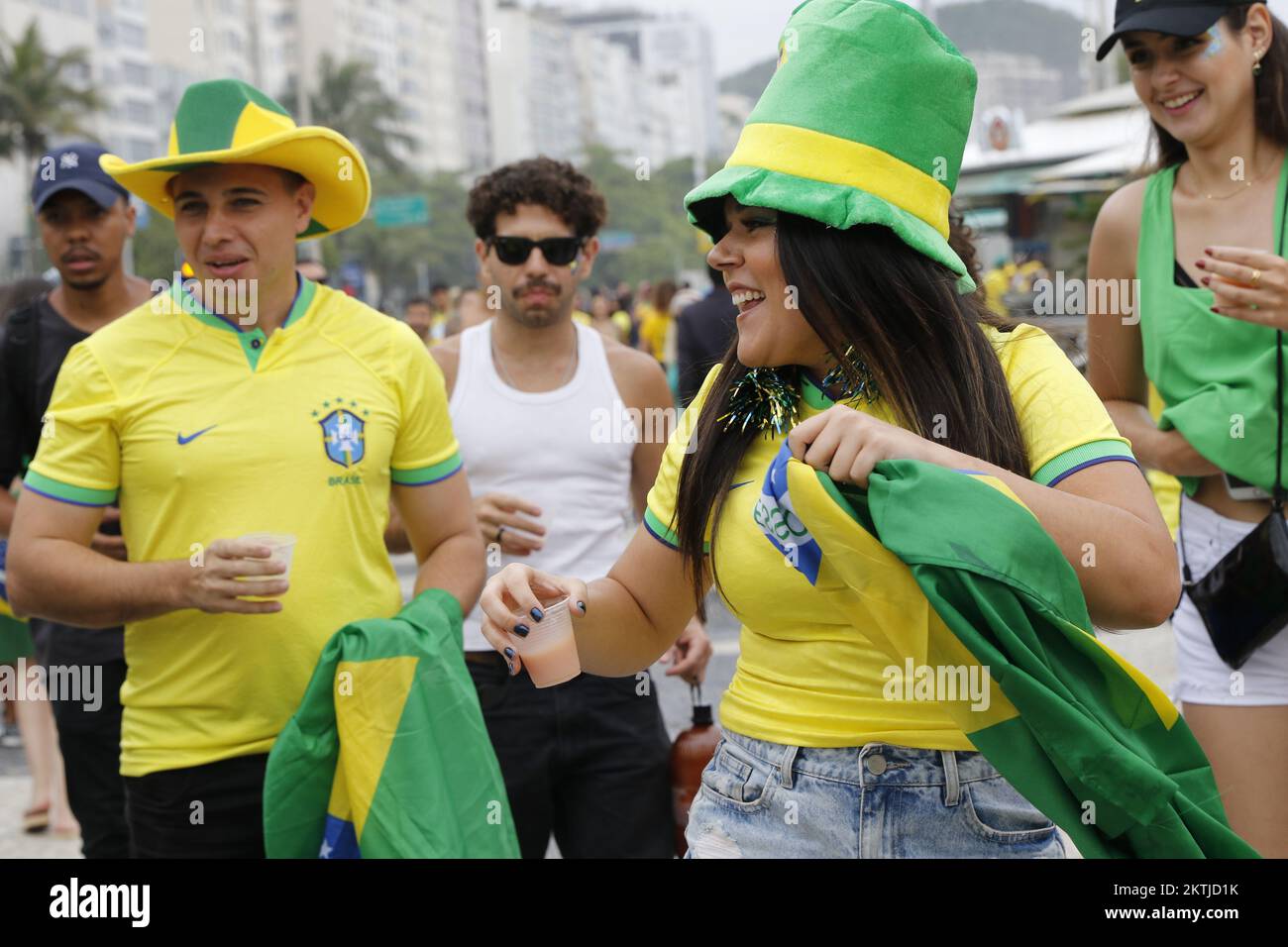 Brazilian fans gather at street party to support national soccer team playing Fifa World Cup at Fan Festival arena Stock Photo