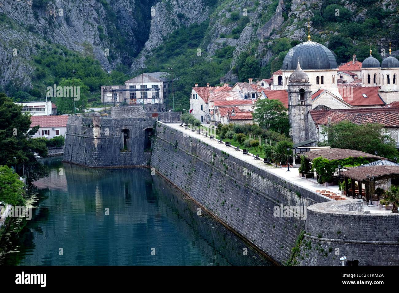 The defensive wall and moat in Kotor Montenegro Stock Photo