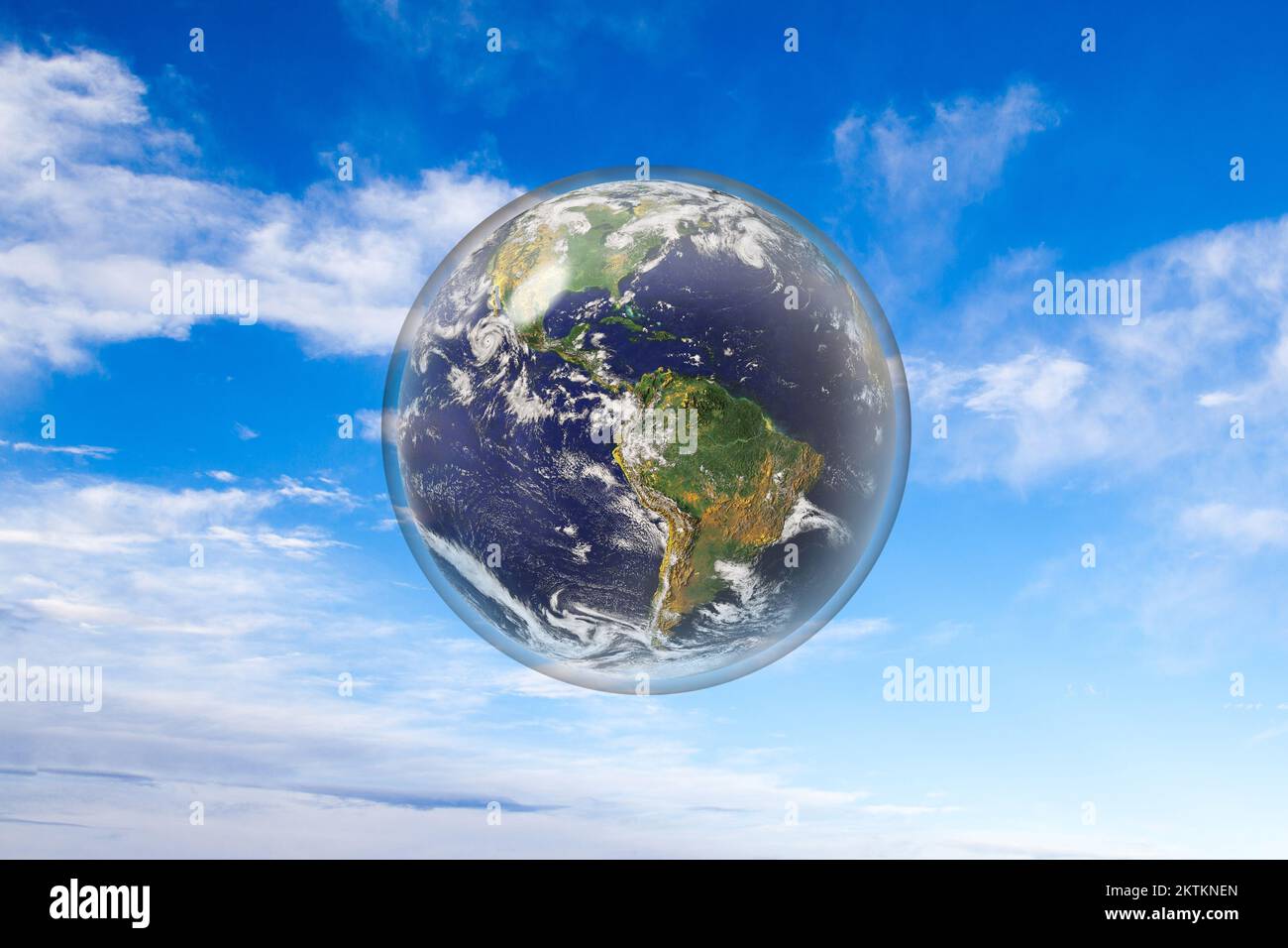 Planet earth protected inside glass sphere. Concept of climate change control, environmental conservation, ecology or green movement. Element of this Stock Photo