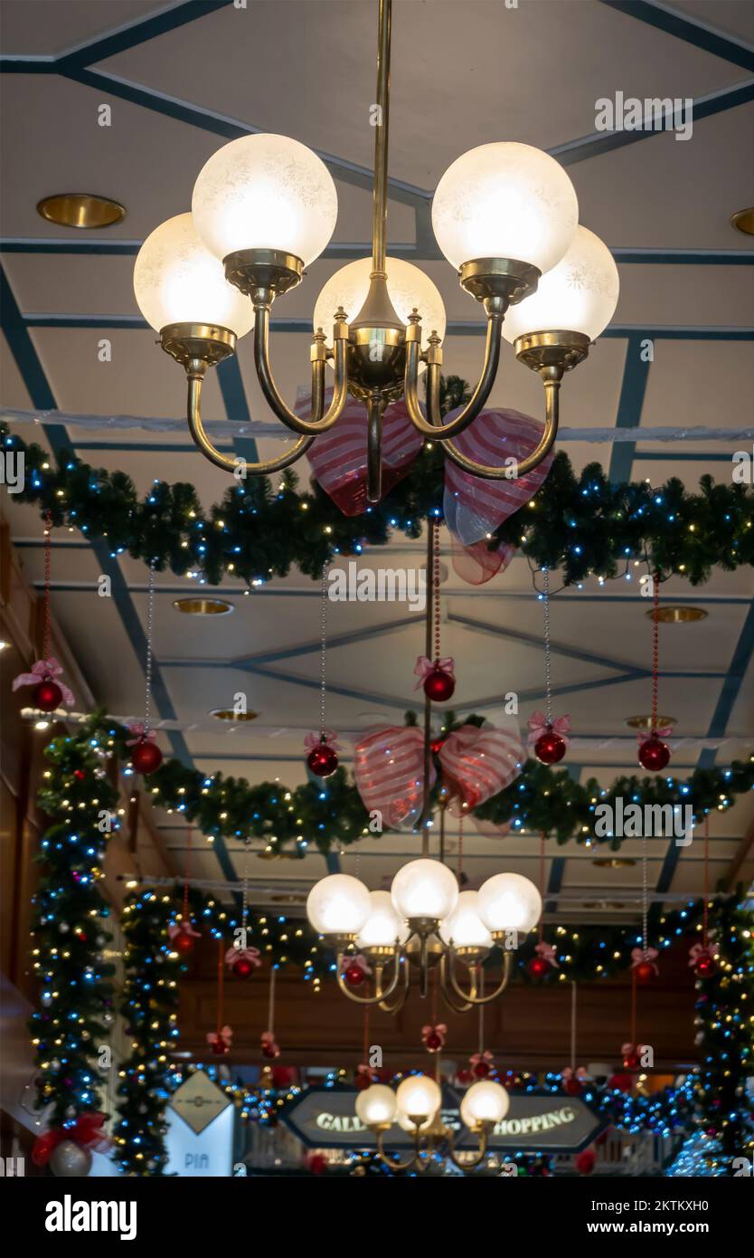 Brisbane, Queensland, Australia - November 2022: Lights and Christmas decorations running along the ceiling of a city arcade. Stock Photo