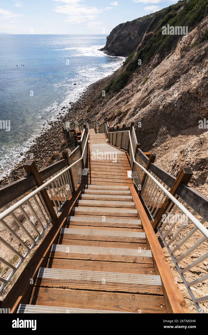 Newly improved stairway leading down to remote Dume Cove beach in Malibu, California.  Vertical view. Stock Photo