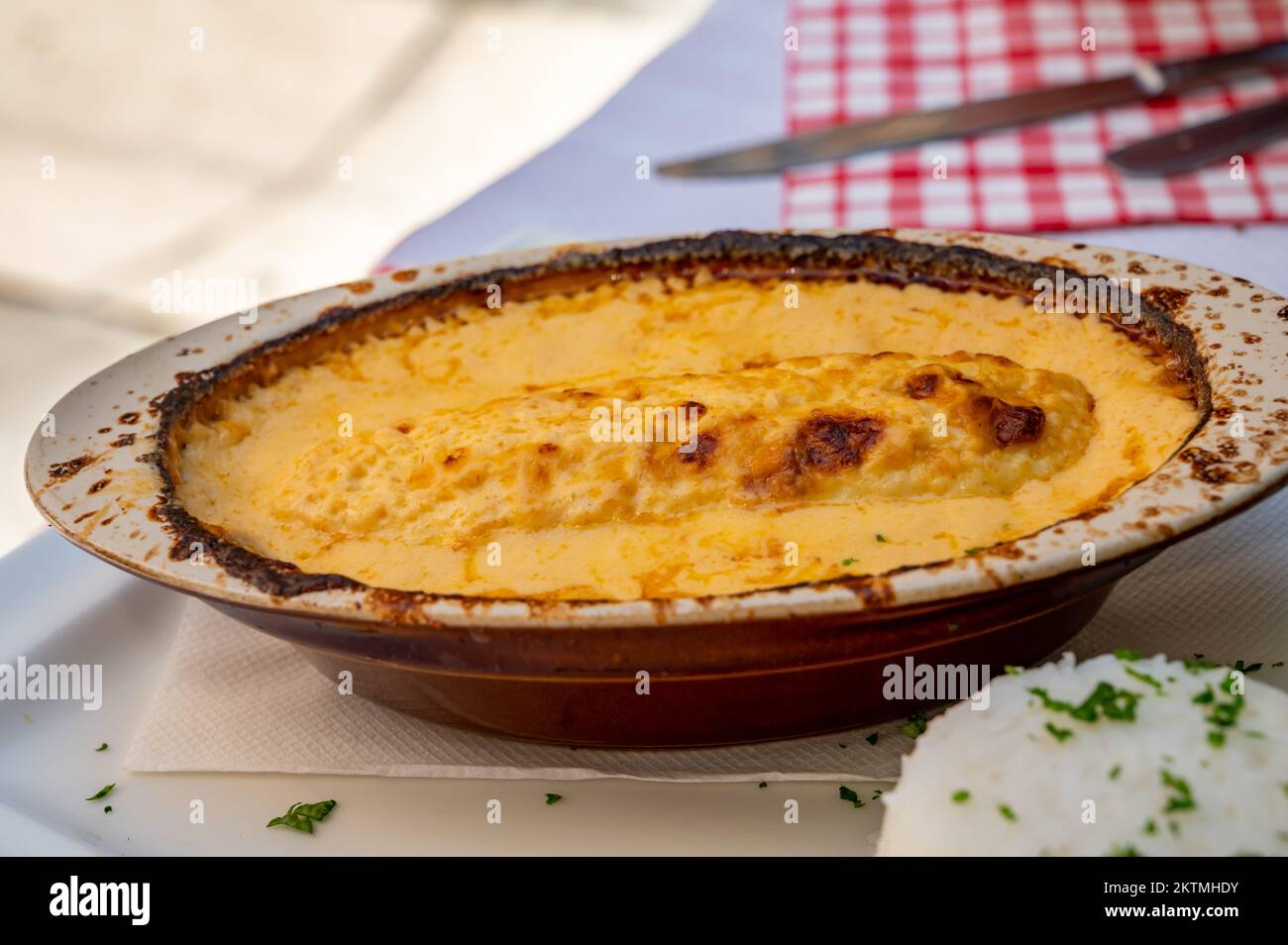 Quenelle, speciality of Lyon, ovalshaped dumplings filled with pike