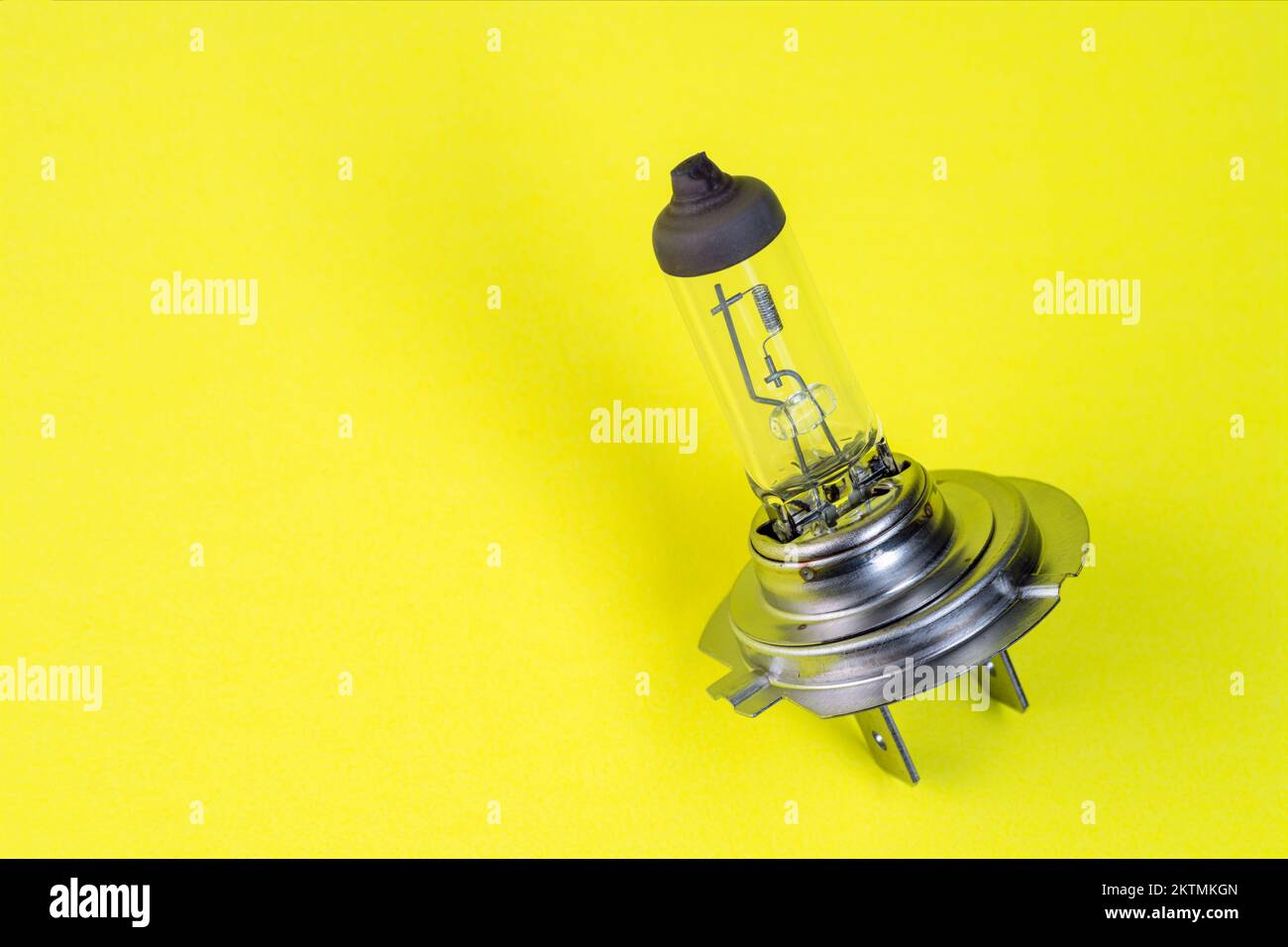 Automotive H7 lamp on color isolated background Stock Photo - Alamy