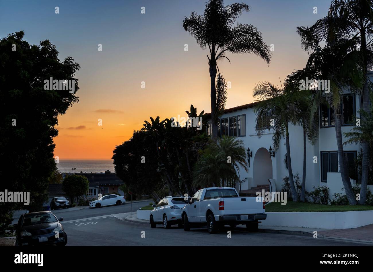 Sunset street in Manhattan Beach town, California. Fashion travel and tropical city concept. Stock Photo