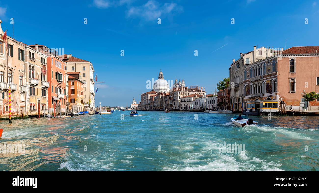 Venice skyline in sunny day. Beautiful Grand canal and Basilica Santa Maria della Salute, Venice, Italy. Stock Photo
