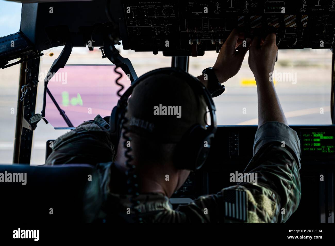 A U.S. Air Force HC-130J Combat King II pilot, assigned to the 81st Expeditionary Rescue Squadron (ERQS) conducts preflight checks aboard an HC-130J on Camp Lemonnier, Djibouti, Oct. 16, 2022. The 81st ERQS is a rapidly deployable combat search and rescue force that can conduct tactical air refueling, airdrop and airland of personnel and/or equipment during day or night operations in support of combat personnel recovery within Combined Joint Task Force – Horn of Africa area of responsibility. (U.S. Air Force photo by Staff Sgt. Devin M. Rumbaugh) Stock Photo