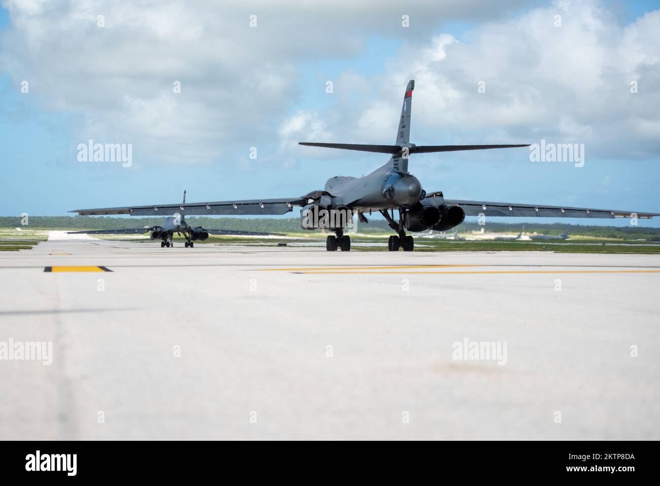 U.S. Air Force B-1B Lancers assigned to the 37th Expeditionary Bomb Squadron, Ellsworth Air Force Base, South Dakota, taxi down the flight line in support of a Bomber Task Force mission at Andersen AFB, Guam, Nov. 19, 2022. The U.S. Air Force is committed to upholding a rules-based, free and open Indo-Pacific that respects every nation and ensures the peaceful resolution of disputes free from coercion. (U.S. Air Force Photo by Senior Airman Yosselin Campos) Stock Photo