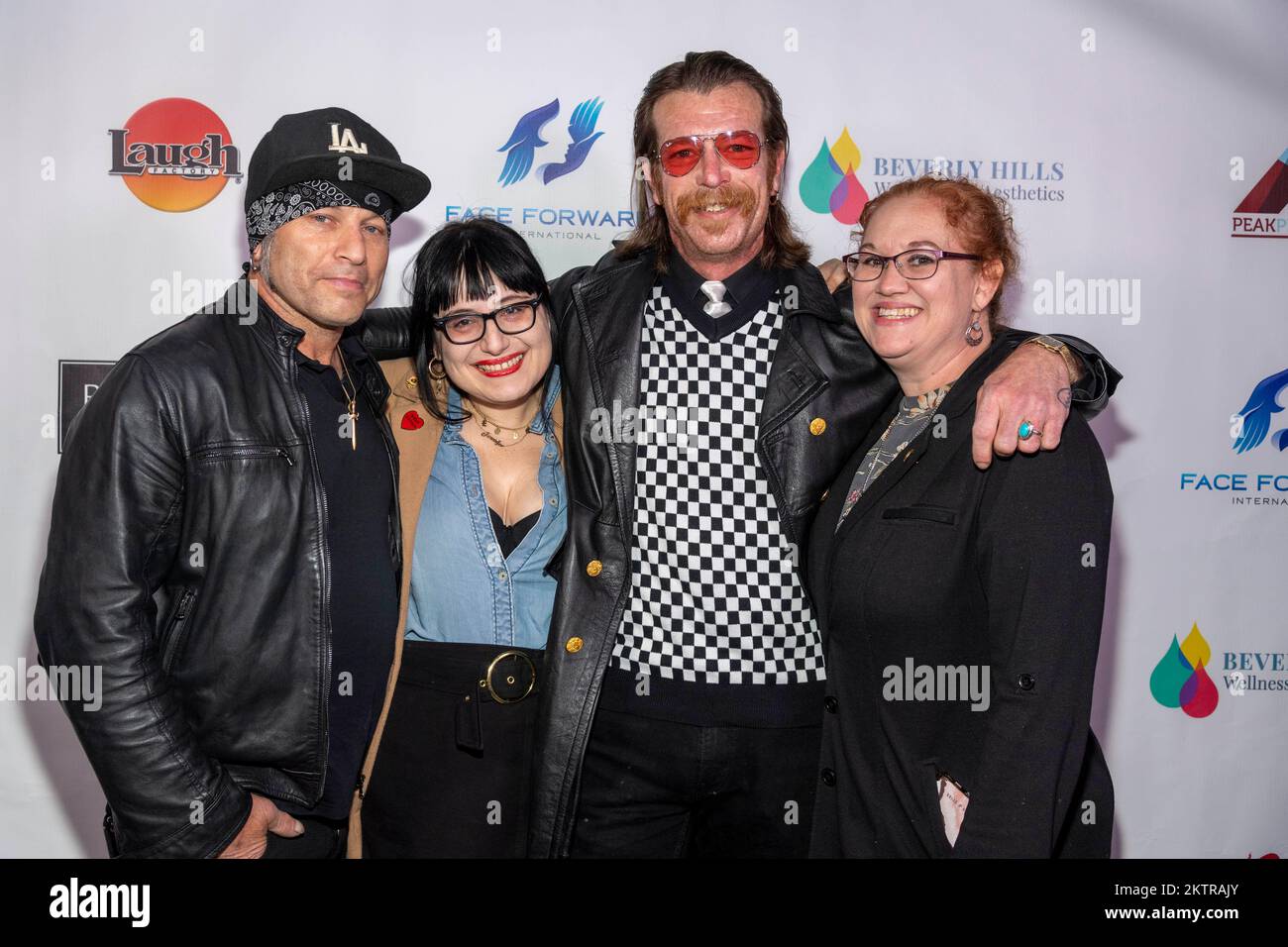 Eric Epple, Jen Ortega, Jesse Hughes, Mandi Budd attend 6th Annual 'Laugh it Forward' Comedy Show to benefit 'Face Forward International' at Laugh Factory, Los Angeles, CA on November 28, 2022 Stock Photo