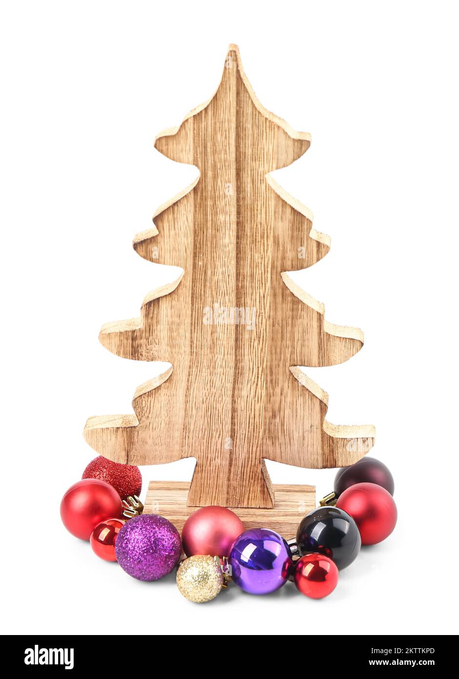 Wooden Christmas tree and balls on white background Stock Photo - Alamy