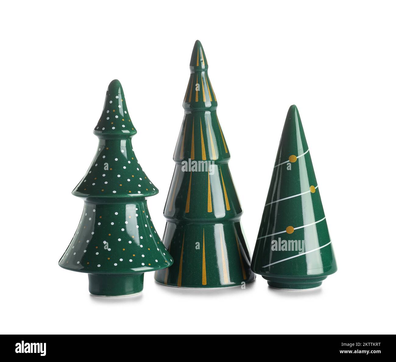 Set of ceramic Christmas trees on white background Stock Photo - Alamy