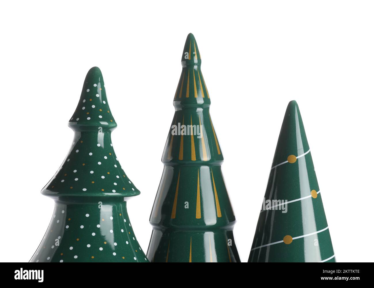 Set of ceramic Christmas trees on white background, closeup Stock Photo