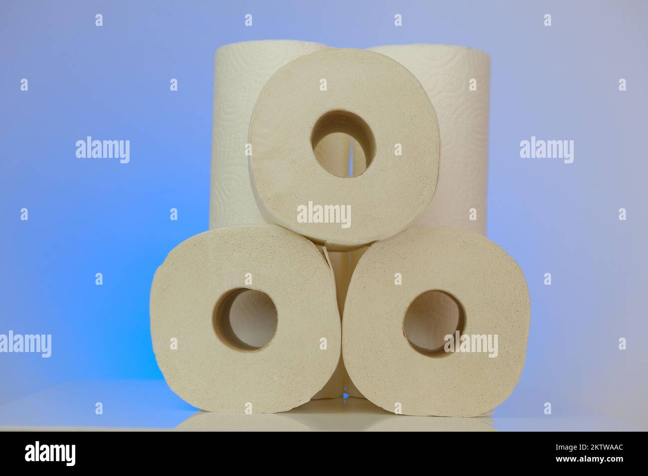 Toilet paper rolls set on a blue background.Purchase and shortage of